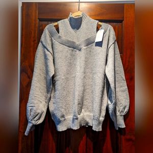 Shoulder cut out turtle neck sweater